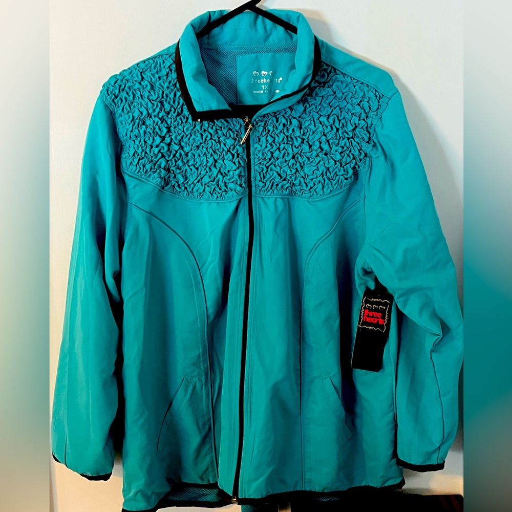 Three Hearts brand aqua colored lightweight jacket. 
Size 1X.  Zippered front.